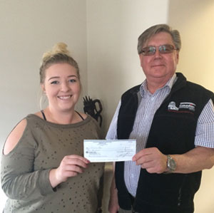 home inspector sw Edmonton presenting cheque