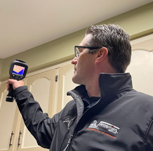 Fredericton home inspector using thermal camera