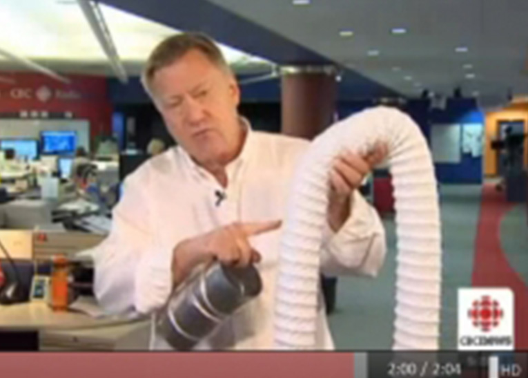 man holding plastic dryer hose