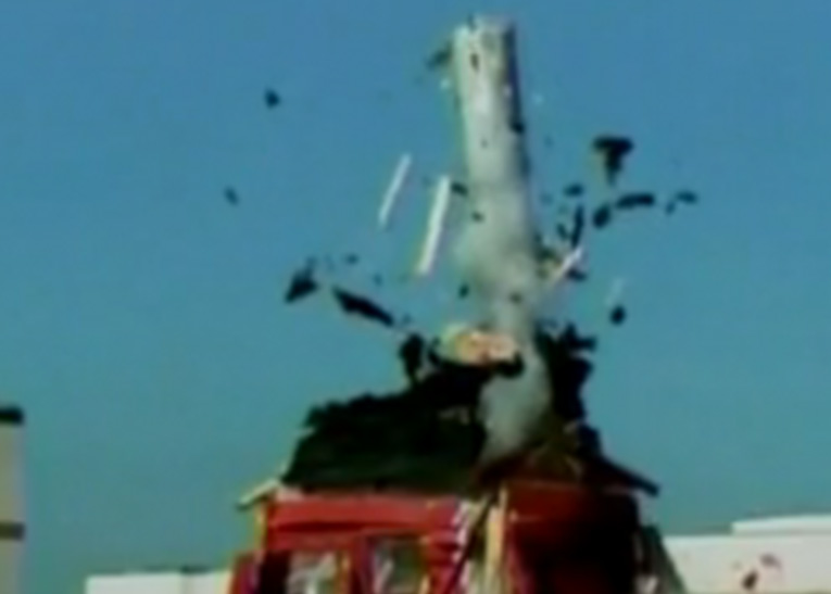 image of hot water tank exploding through roof