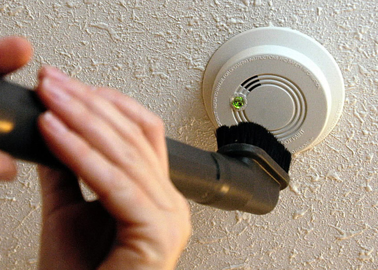 vacuuming smoke detector